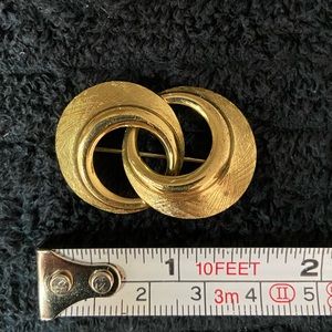 Gold tone double ring brooch, EUC